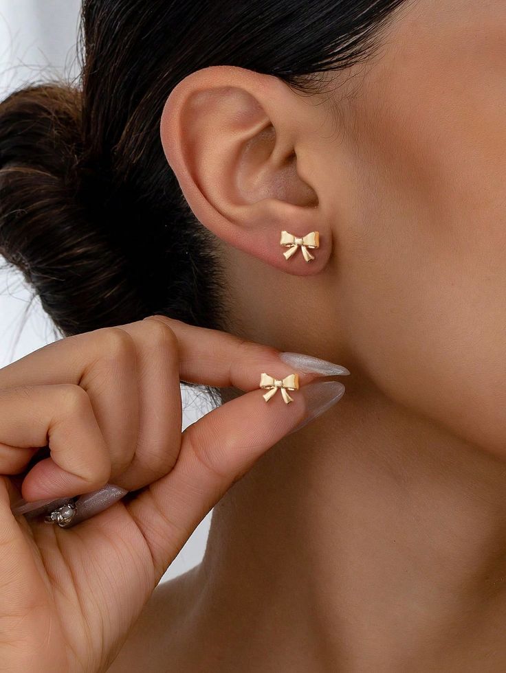Small Gold Bow Tie Studs Earrings - Image 3